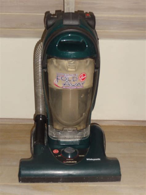 hoover fold  widepath bagless upright vacuum cleaning equipment