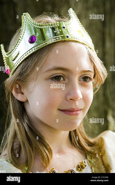girl wearing crown dressed   queen stock photo alamy