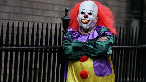 creepy clown sorry for chainsaw stunt amid rise in sightings bbc news