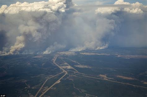 alberta wildfire captured  amazing aerial photographs  canada daily mail