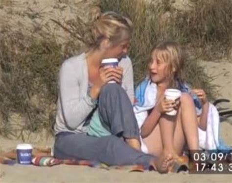 7 year old girl filmed undressing on beach by private