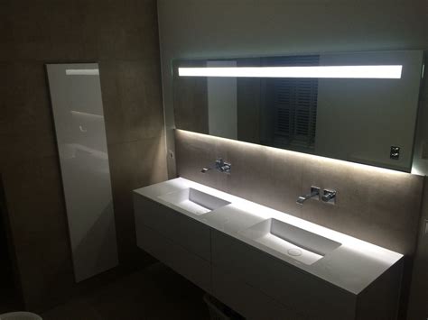bathroom   sinks   large mirror   sink  illuminated  lights