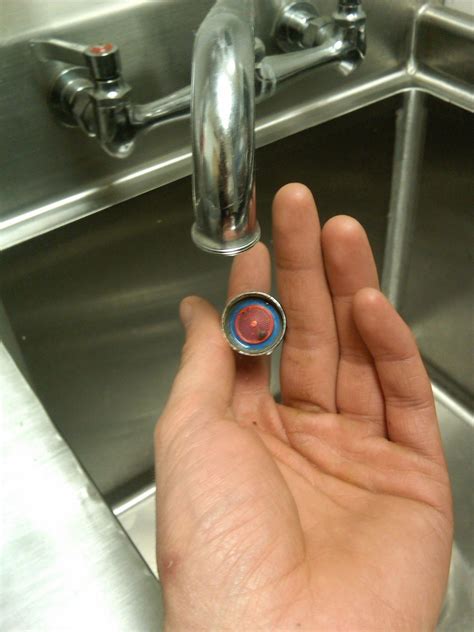 cleaning  blocked faucet aerator