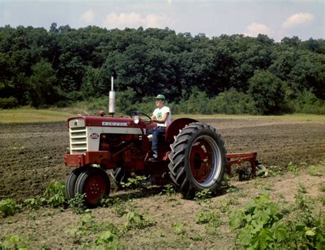 youth plowing field  farmall  tractor photograph wisconsin historical society