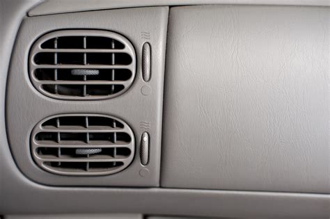 stock photo  close  air conditioner vents   car