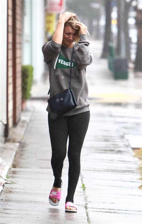 kaley cuoco in spandex leaving the gym getting caught in the rain without an umbrella 12 22 2015