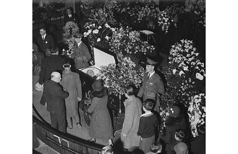 32 photos of celebrity open casket funerals that will