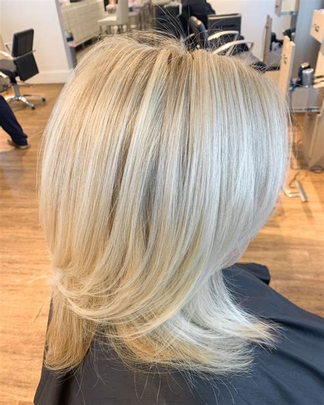 bright blonde  goldwell hair color  interlocks salon spa