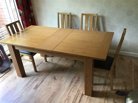extendable dining table    exhaust sold  malvern dining table