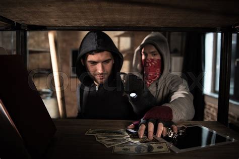 Stock Image Of Two Robbers Stealing Money And Valuables House Robbery