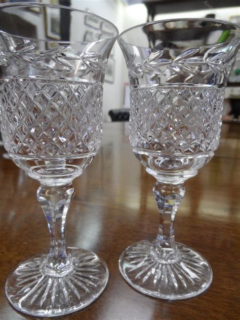 antiques atlas pair  thistle shaped cut glass wine glasses