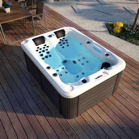 person outdoor hydrotherapy bathtub hot bath tub whirlpool spa sym