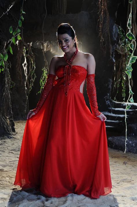 tashu kaushik latest hot photo gallery in red shoulderless