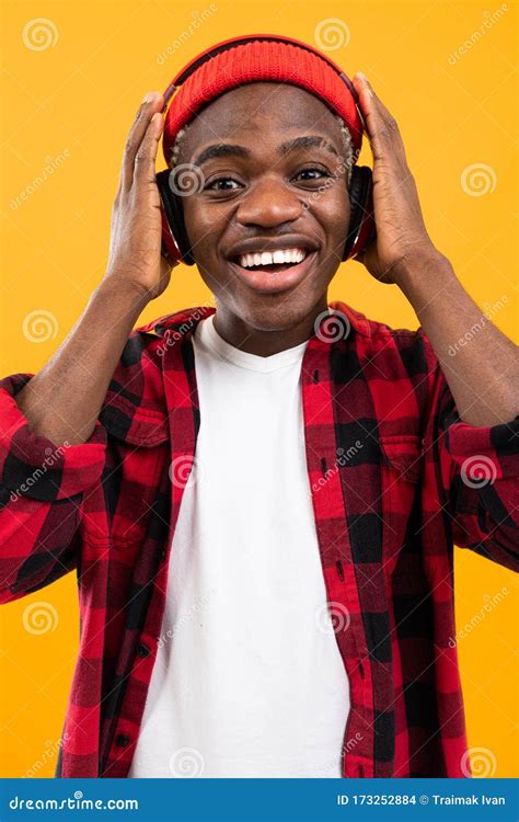 attractive black american guy listening    headphones stock photo image  african