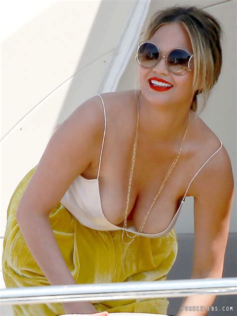 chrissy teigen topless and huge cleavage moments