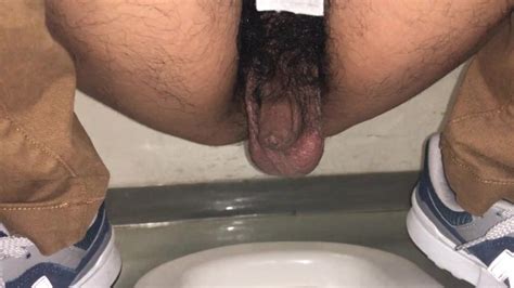 men s toilet photographing the phimosis penis in the pee from the