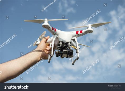 istanbul turkey    man holding dronedrone quadrocopter dji phantom   digital