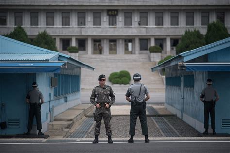 north korean shot   apparently defects  dmz wsj