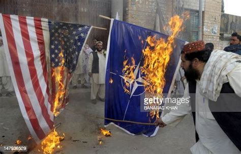 activists  awami majlis  amal pakistan burn nato   flags
