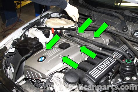 bmw  engine cover removal    pelican parts diy maintenance article