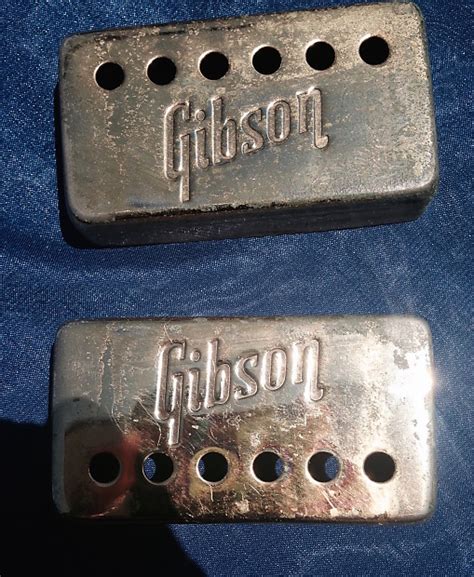 Gibson Gold Embossed Pickup Covers Pair 1971 Gold Reverb