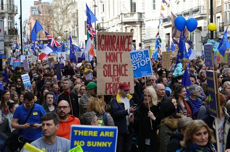peoples march london     banners  placards  huge brexit march london