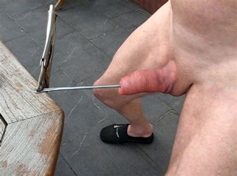 urethral sounding all by himself is kinky gay bizarre