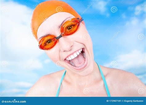 Joy Of A Victory A Winner Young Cheerful Female Swimmer In An Orange