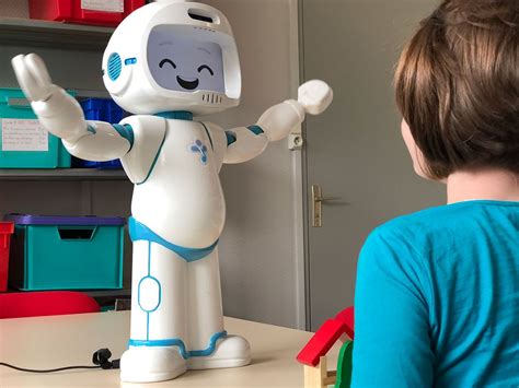 therapy robot teaches social skills  children  autism ieee spectrum
