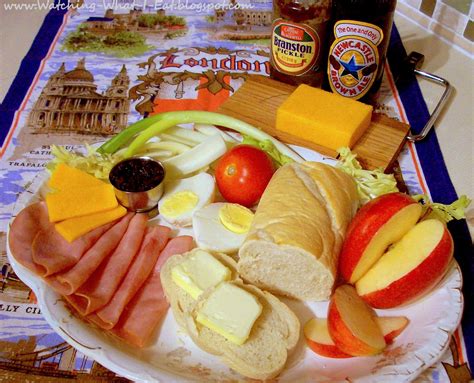 watching   eat ploughmans lunch   enjoy  traditional pub