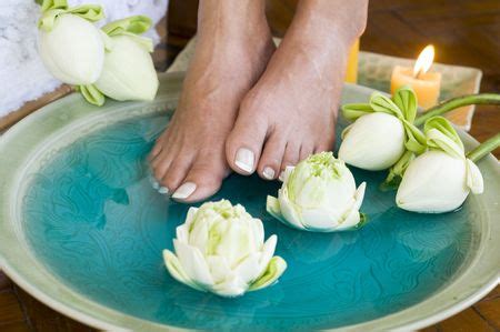 feet enjoy  relaxing aromatherapy foot spa  lotus flowers