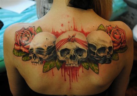 New School Style Colored Upper Back Tattoo Of Skulls With Roses