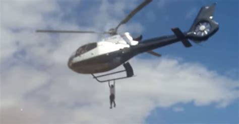 man hangs on to helicopter carrying dead man to funeral huffpost