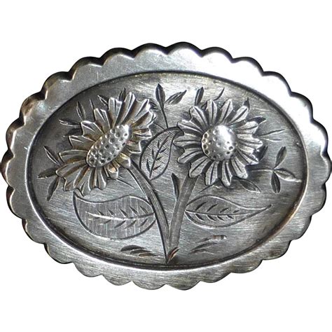 antique sterling engraved aesthetic floral design pin from