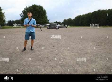 foreground drone flies guy controls drone stock photo alamy