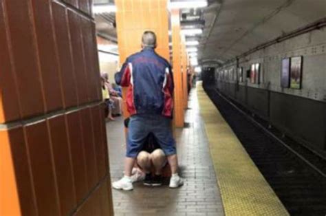 Irate Commuter Takes Photo Of Over Amorous Couple On