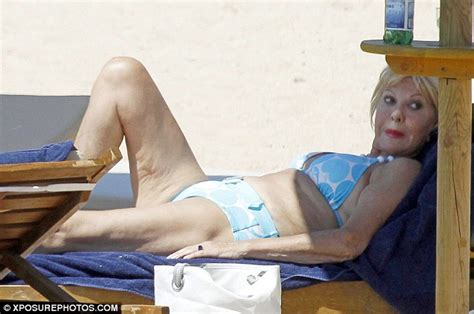 ivana trump soaks up the sun with her very attentive ex husband rossano rubicondi during holiday