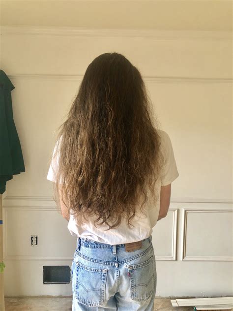 Soft Light Curly Brown Hair With Natural Highlights