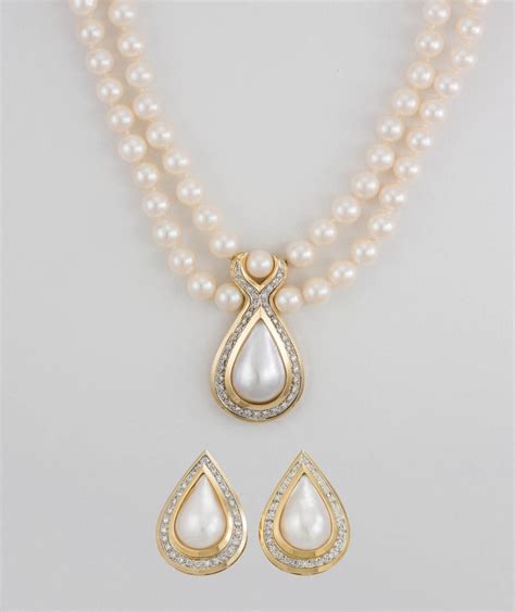 ladies pearl necklace earring set   yellow gold diamonds  length tangible investments