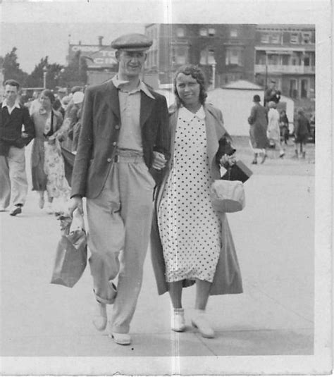 photograph snapshot vintage black and white couple dress smile walk