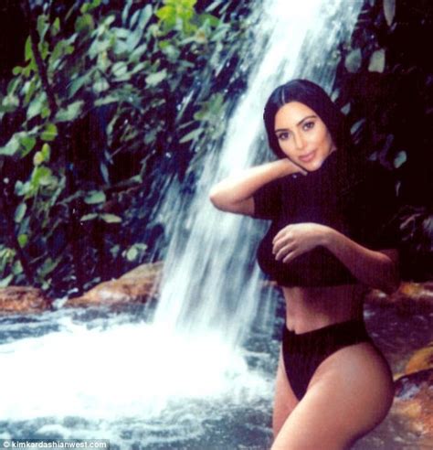 Kim Kardashian Shows Off Her Sexy Body Beside Waterfall