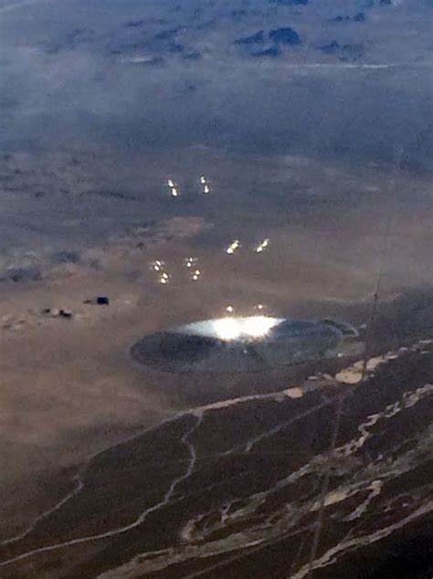 airplane passenger snaps ufo  ground  mysterious area  military base science news