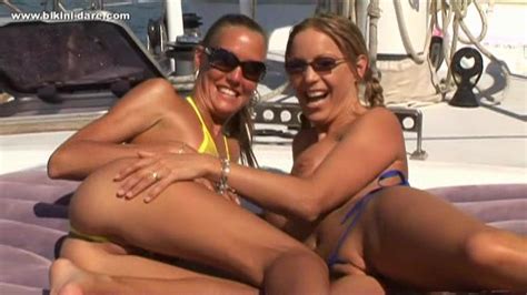 Two Lovely Beauties Are Enjoying Hot Nude Posing On The Boat