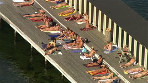 tourist sunbathing sweden hd stock video 325 917 368 framepool and rightsmith stock footage