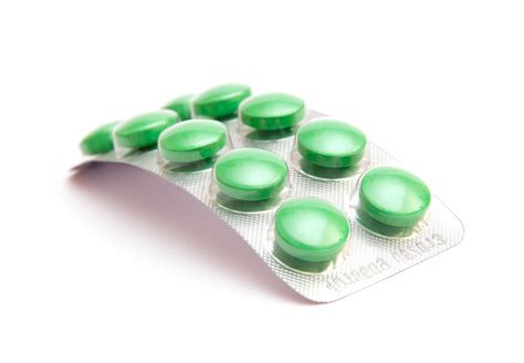 green pills green pills isolated  white background   flickr