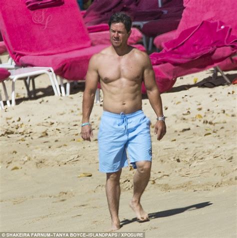 shirtless mark wahlberg displays his enviable six pack as