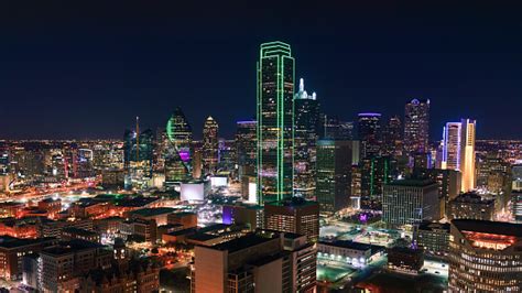dallas texas cityscape  skyscrapers illuminated  night stock