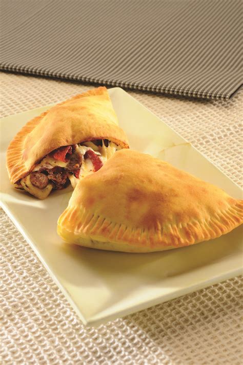 dominos  scrumptious puff pastry calzone freshly baked    calzone dominos