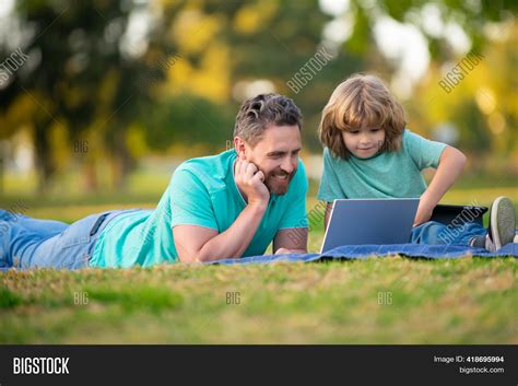 father teaching son image photo  trial bigstock