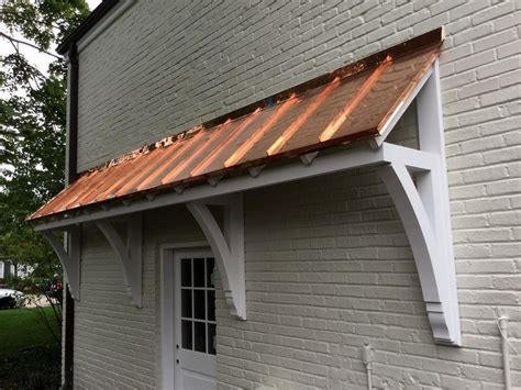 custom bracket  roof overhang house awnings garage door styles facade house